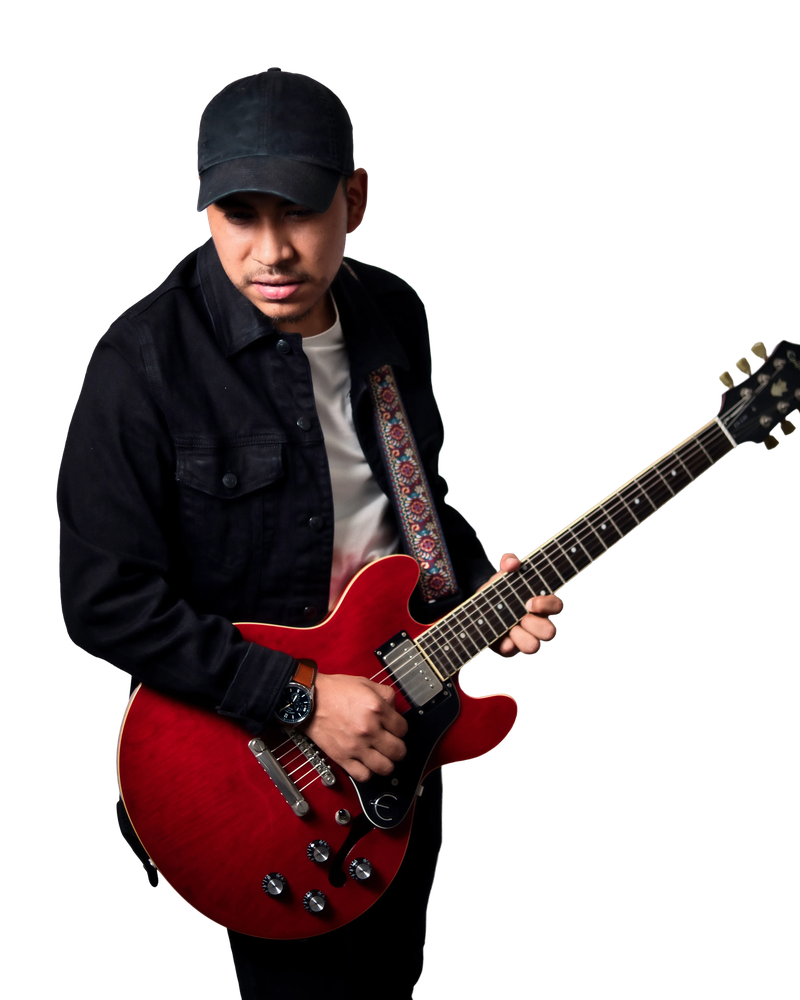 Fredy playing guitar