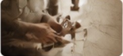 Hands assembling furniture details in the workshop